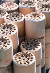 Stacked Yeontan, burnt briquettes used in yard.