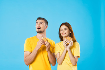 cheerful young couple in t-shirts