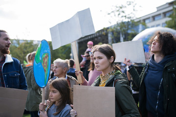 People with placards and posters on global strike for climate change.