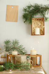 Golden Christmas candles burning, festive atmospheric lights composition.
