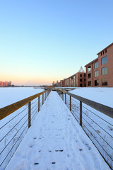 wooden bridge in the snow
