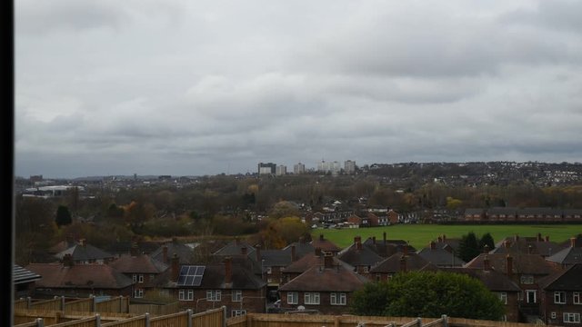 A time lapse of the city of Stoke on Trent skyline during the daytime showing rolling clouds.