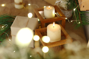 Christmas candles with evergreen decorations.