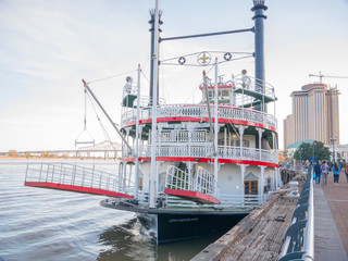 Fototapeta na wymiar New Orleans paddle steamer in Mississippi river in New Orleans, Lousiana