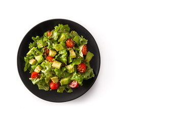 Salad with avocado, lettuce, tomato, flax seeds isolated on white background top view copy space