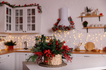 Fototapeta na wymiar Kitchen decorated for Christmas in red colour