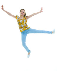 A teenage girl is jumping