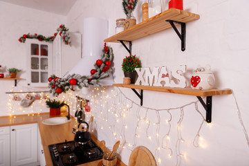 Kitchen decorated for Christmas in red colour