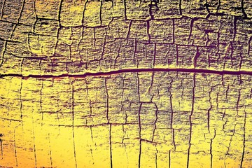 Yellow brown abstract background with cracks.