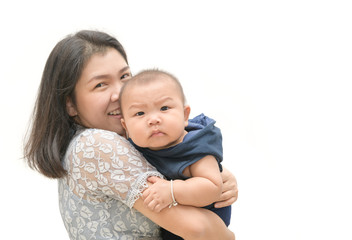 Happy asian mother holding baby in her arms isolated