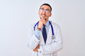Young doctor man wearing stethoscope over isolated background Thinking worried about a question, concerned and nervous with hand on chin