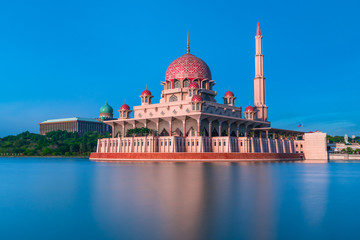 Putra mosque during sunset blue sky, the most famous tourist attraction in Malaysia.