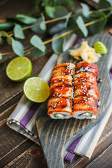 sushi with salmon and avocado. Sushi roll with salmon and tempura shrimp