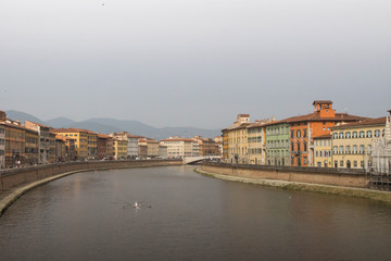 Fototapeta premium Day view over Arno river in Pisa, Tuscany, Italy