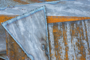 abstract background iron rust and fragmented steel segmants