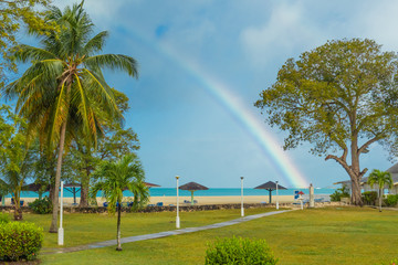 Jolly Beach, St. Mary / Antigua - 04 14 2018: Rainbow over Jolly Beach, Antigua