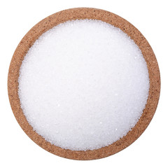 Sugar on a plate on a white background
