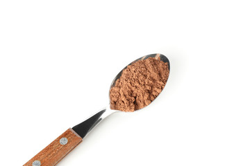 Spoon with cocoa powder isolated on white background