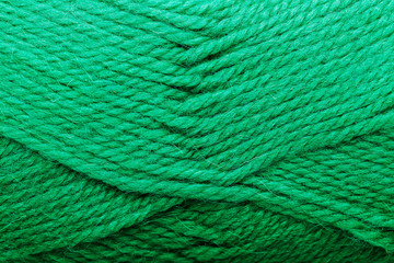 Wool yarn close up colorful aquamarine threads for needlework in macro.