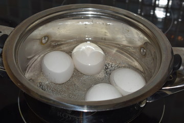 Fototapeta na wymiar boiled eggs in a pot of water