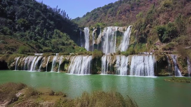 Aerial view drone flight above Jiulong waterfall in Luoping, Yunnan, China