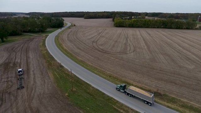Semi hauling load of soybeans during harvest