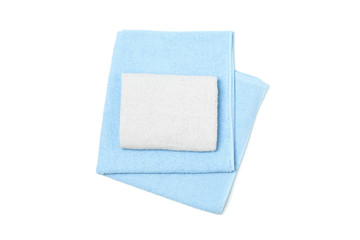 White and blue towels isolated on white background, top view