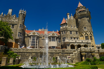 Obraz premium Gothic revival architecture of Casa Loma castle in Toronto with garden fountain