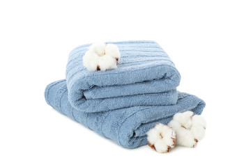 Fototapeta na wymiar Folded blue towels and cotton isolated on white background