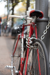 Fototapeta na wymiar locked bicycle on a white background