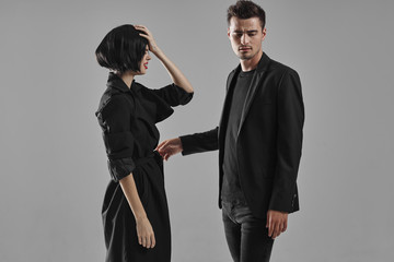 man and woman in black suit