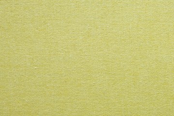 Bright yellow pastel cloth fabric basket weave texture. Cotton made shirt close up shot. Smooth and soft touch people can wear it for comfort summer dress. background texture concept.