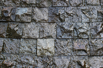 Wet square stone slabs as a background