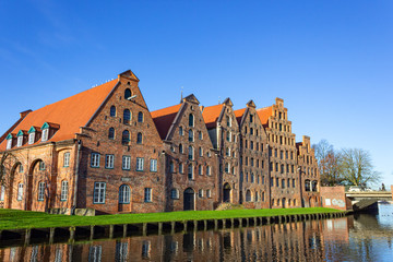 Old salt kontor at trave river on a sunny winter day in Lübeck, Germany