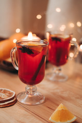 Atmospheric Christmas or New Year background with mulled wine. Close up of mulled wine, soft focus, shallow depth of field