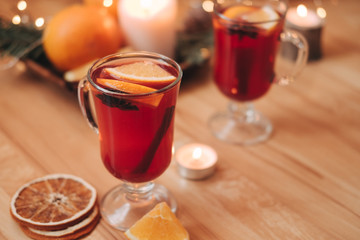 Atmospheric Christmas or New Year background with mulled wine. Close up of mulled wine, soft focus, shallow depth of field