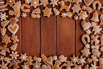 Top view of Christmas table with homemade gingerbreads and copy space