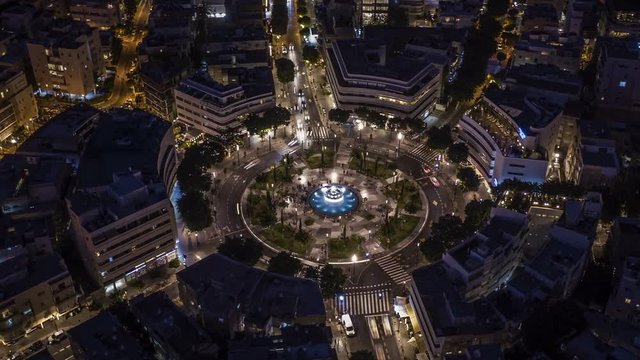 Big roundabout - Aerial hyperlapse - Dizengoff square in tel Aviv, Israel, at night, 4k drone view