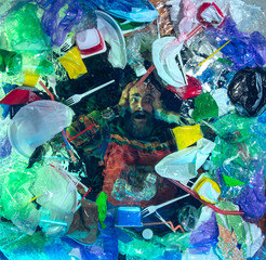 Man drowning in water under plastic recipients pile, garbage. Used bottles and packs filling world ocean killing people. Ecology, environment concept, plastic and glass pollution, nature disaster.
