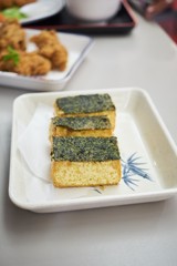 Tofu with spinach on top