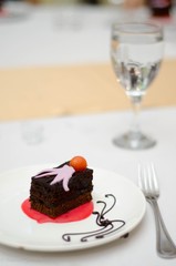 chocolate cake with strawberries and cream