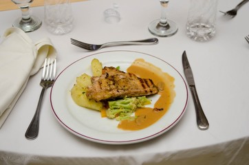 steak with potatoes and vegetables