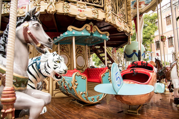 Fototapeta na wymiar Classic merry-go-round or carousel at the winter fair