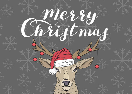 Merry Christmas. Poster with a deer in a Santa's hat and red balls