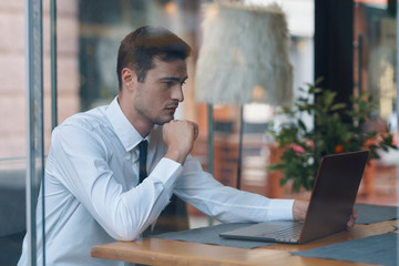 businessman sitting in cafe