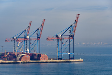 Fototapeta premium Cargo port cranes. Sea landscape.