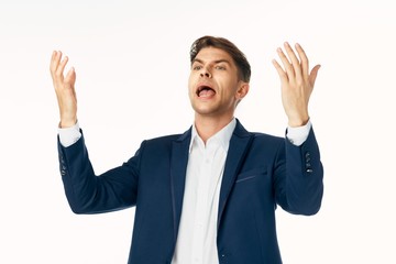 happy business man with arms raised