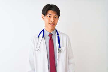 Fototapeta premium Chinese doctor man wearing coat tie and stethoscope over isolated white background with a happy and cool smile on face. Lucky person.
