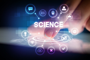 Finger touching tablet with web technology icons and SCIENCE inscription, web technology concept