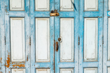 old wooden door with lock blue color